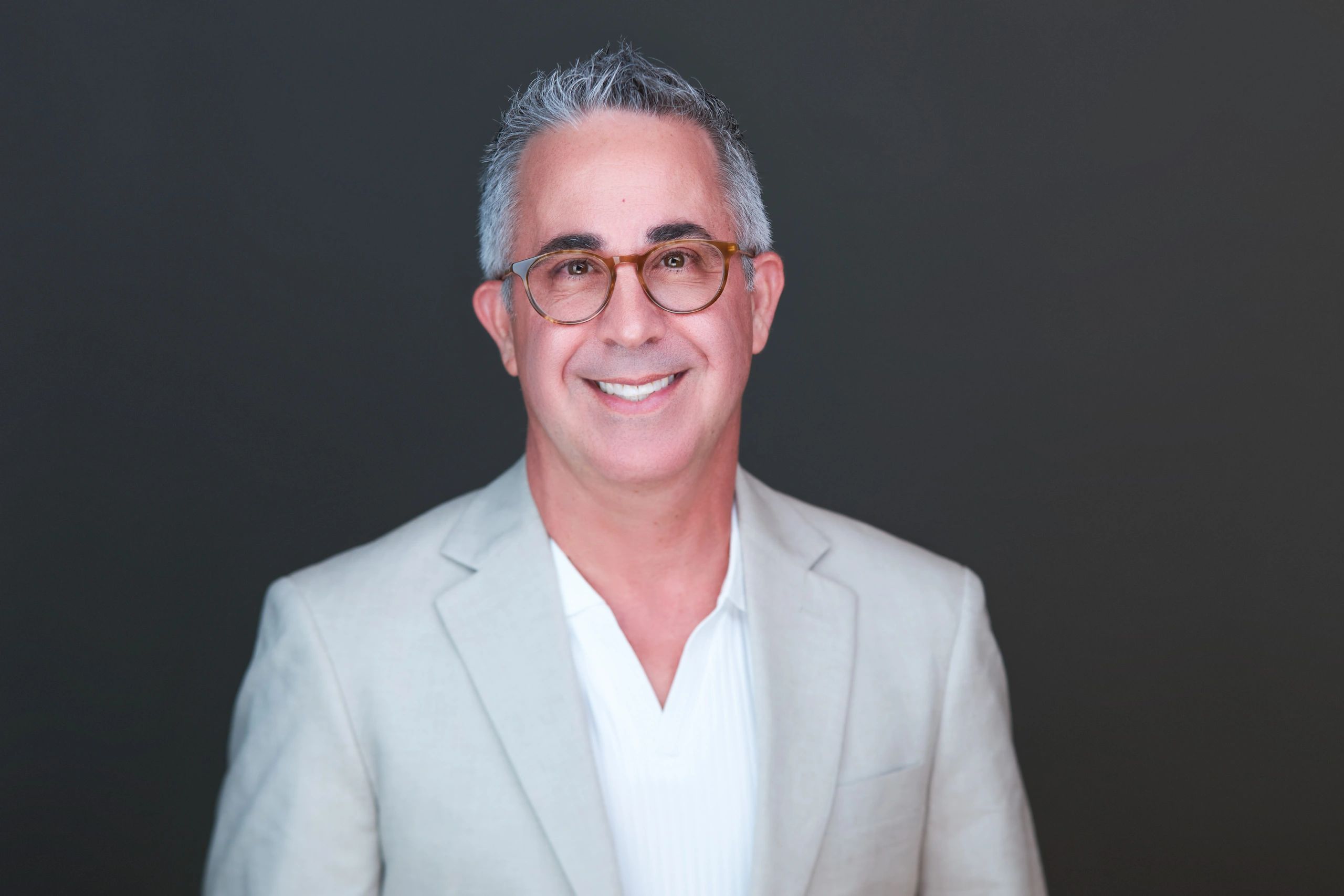 Matthew Stevens, Broker Associate at Infinite Miami Team, smiling headshot portrait