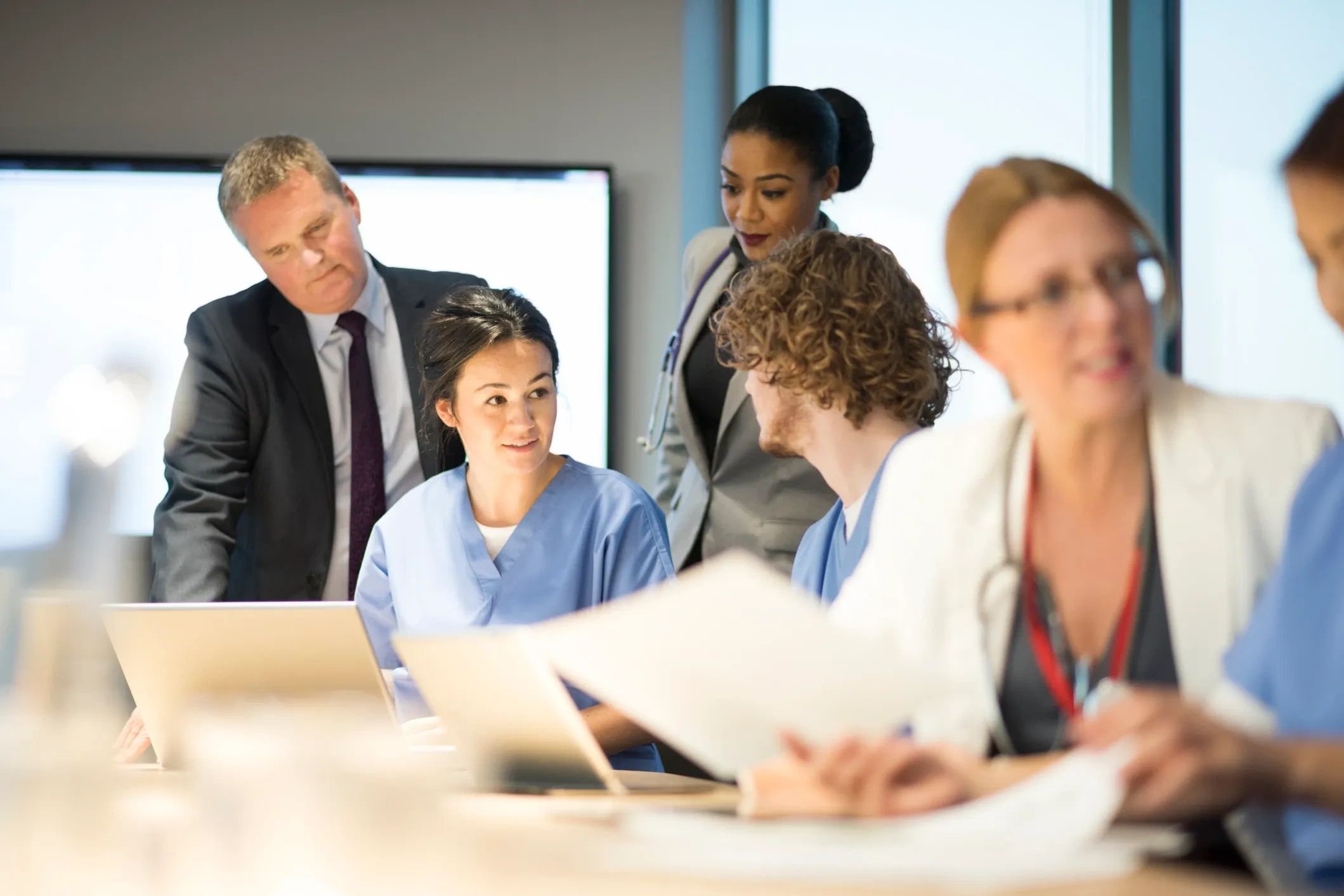 Group of people at a table working together