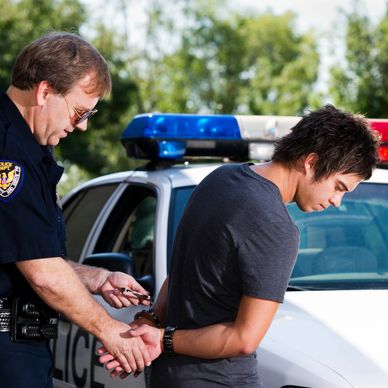 A man getting arrested for possible DUI