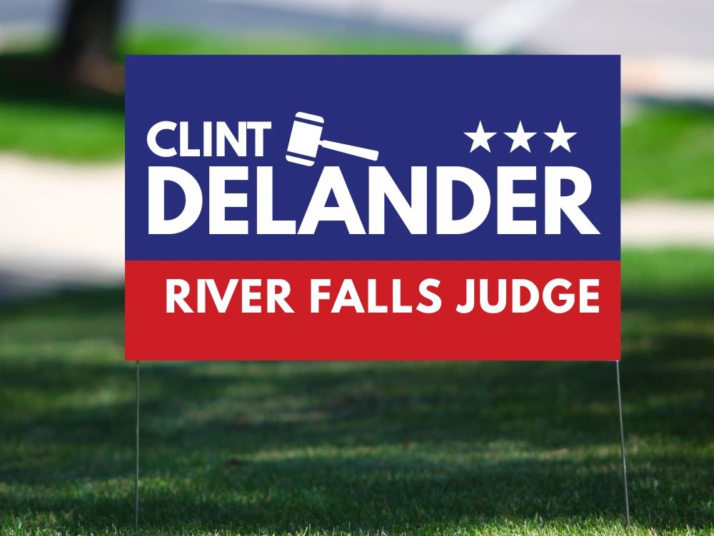 Political yard sign for Clint Delander, River Falls judge.