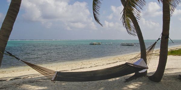 Relax on a hammock on a Mexican beach in Cancun, Tulum, Cozumel or Isla Mujeres Mexico 