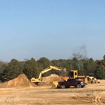 Red Select dirt piled and ready for haul out. Material haulers, Dirt Pit, Pit, Dirt supplier, select fill, sand 