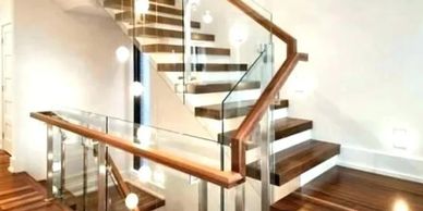 stairwell and handrails we stained and lacquered for a home painting project.