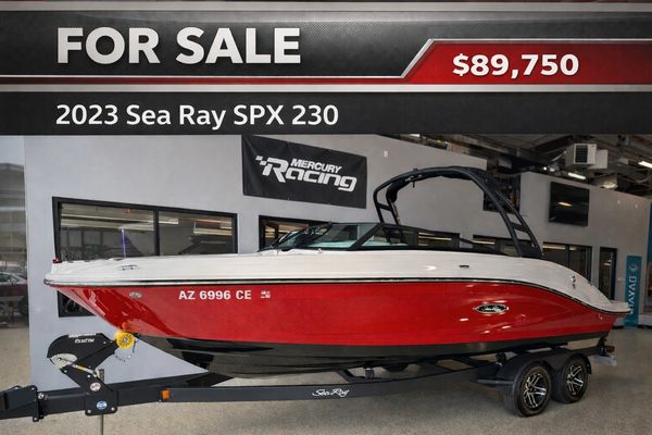 2023 Sea Ray SPX 230 boat for sale at $89,750 in a showroom.