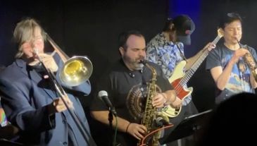 The Sugar House Band performing onstage