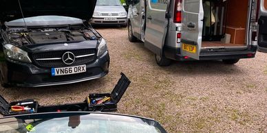 Mobile fitting of a windscreen at a customers address.