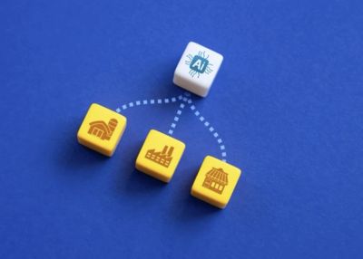 White die with AI symbol connected to three yellow dice with different industry icons.