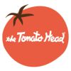 A red tomato graphic with 'the Tomato Head' written inside in white.