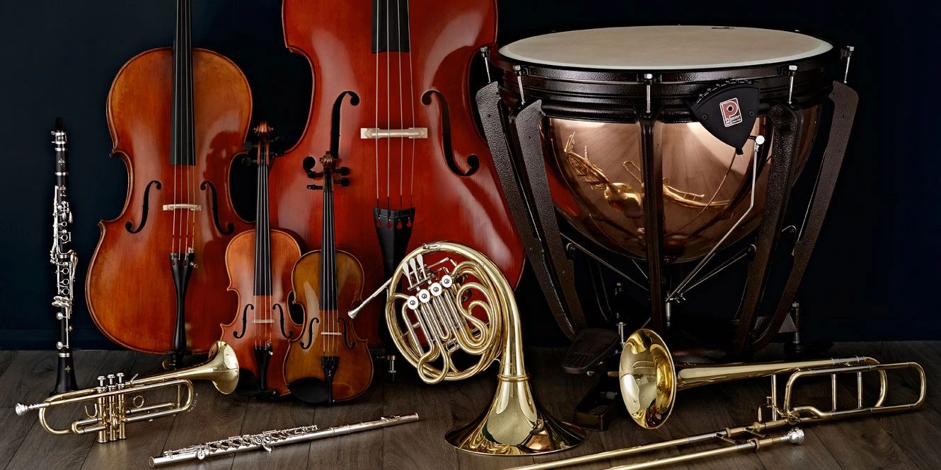 Various musical instruments arranged on the floor.