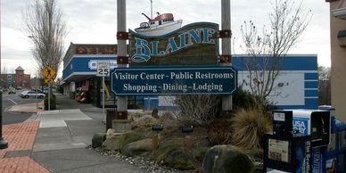 welcome sign for the city of Blaine. Sign reads: Visitor center, shopping, Dining, Lodging