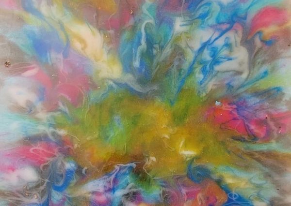 Abstract painting with vibrant swirls of blue, pink, yellow, and green.