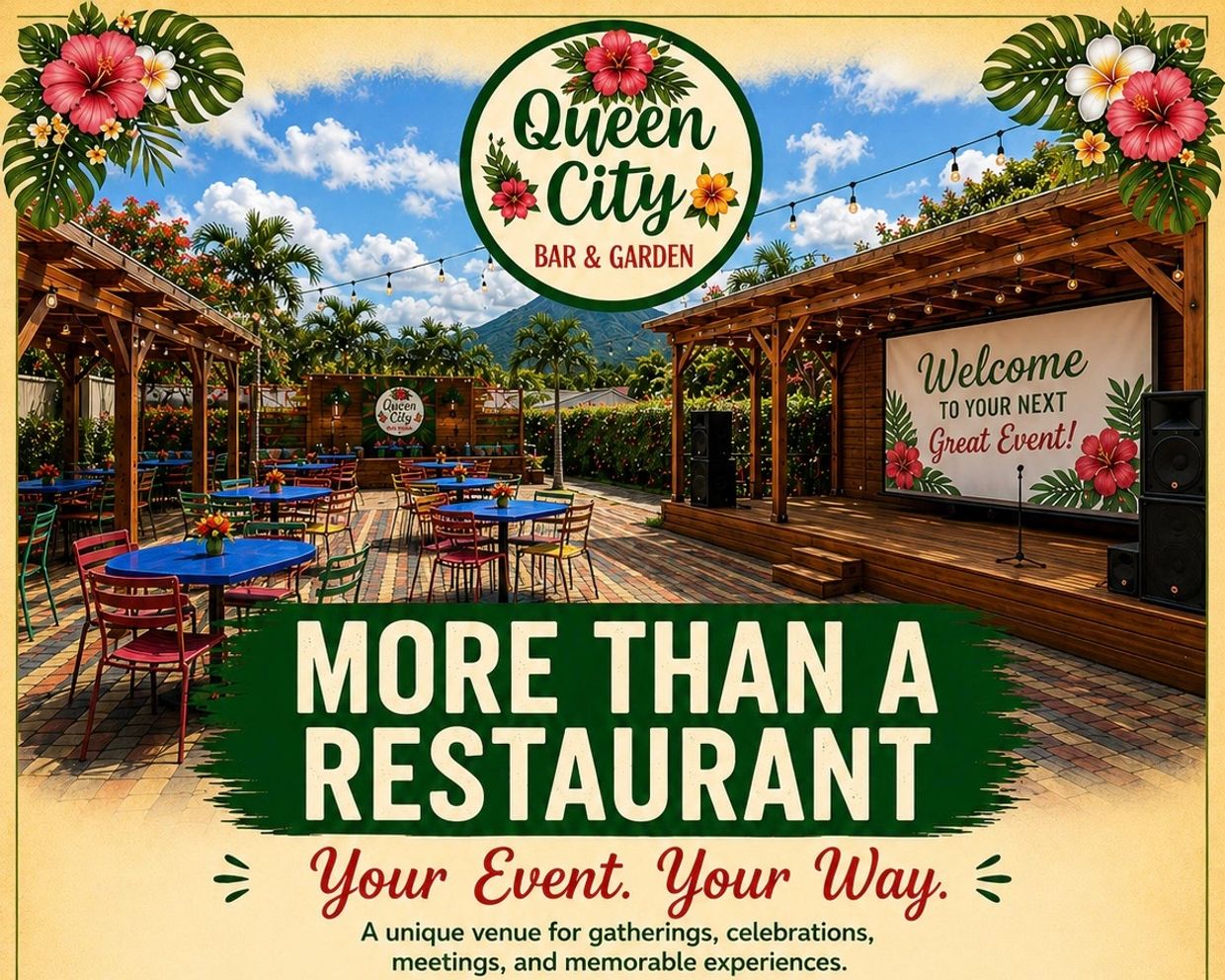 Outdoor event venue with tropical decor and stage setup at Queen City Bar &amp; Garden.