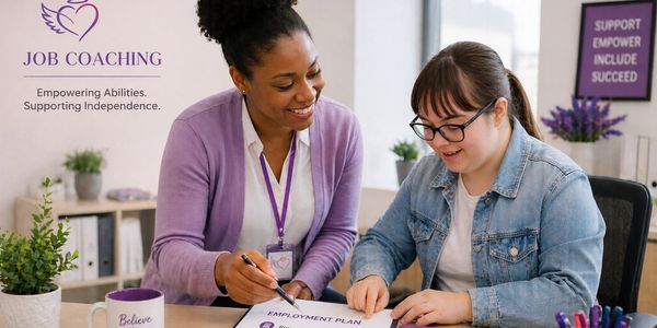 A job coach assists a young woman with an employment plan in a supportive setting.