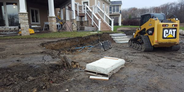 Boulder wall construction, Irrigation Repair, Stone steps