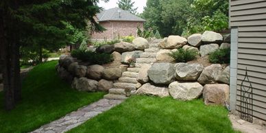 Boulder walls with stone steps