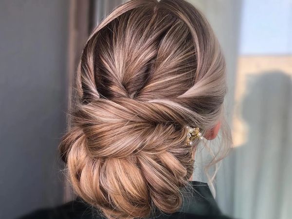 styled hair for wedding day on a bride taken inside of a hair salon in penfield ny
