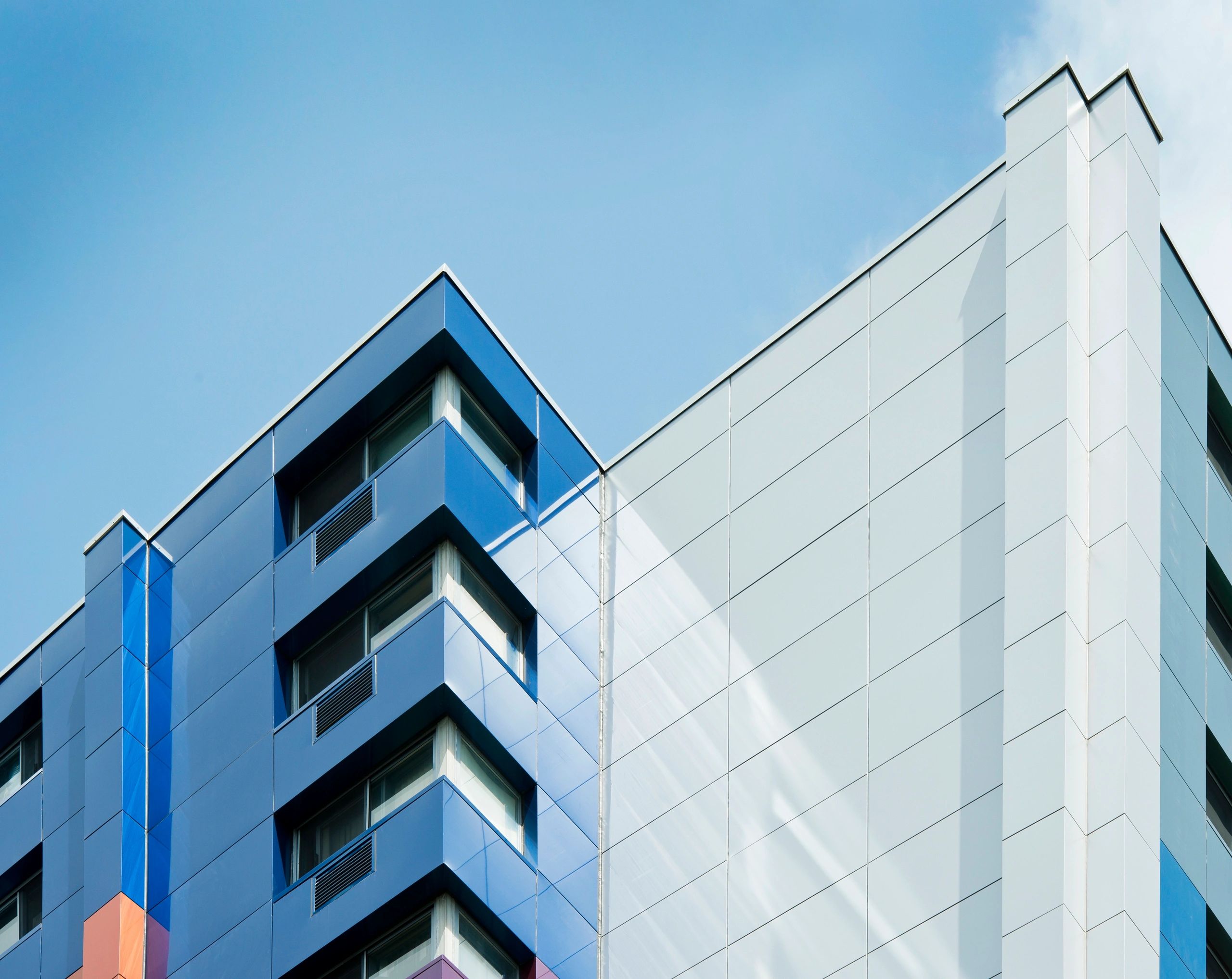 Top of a multi-color ACM exterior building 