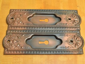 Pair antique early 1900s sliding door pull with copper flash Japanned finish by P & F Corbin S3