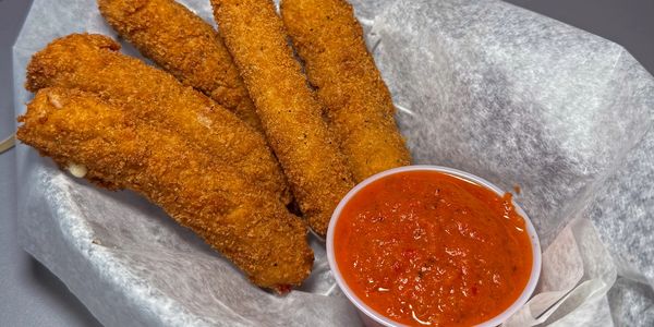 Fried mozzarella sticks with marinara sauce.