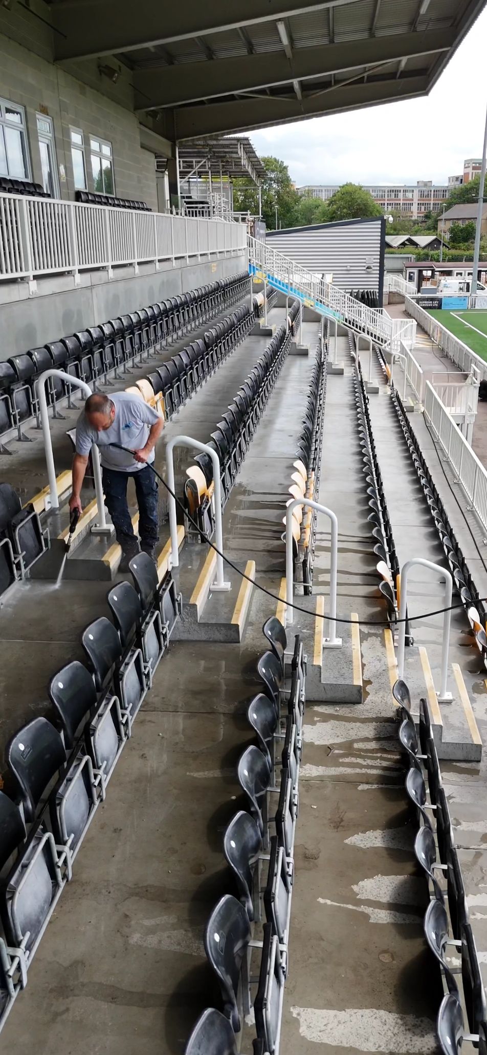 Cleaning the main stand at the Gallagher Stadium (Maidstone United)