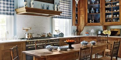 Betty Gertz's timeless kitchen designed by  Axel Vervoordt, featuring classic rush chairs done by Da