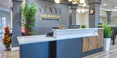 Modern reception desk at The Bentley retirement community.