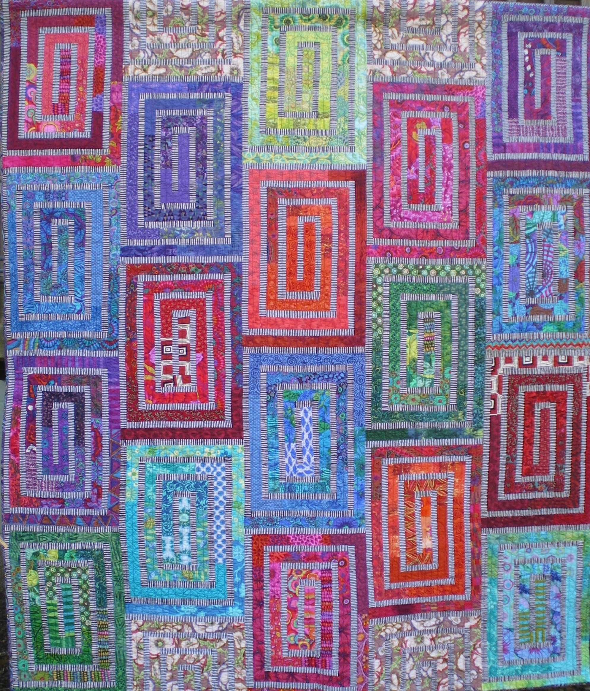 Hoopla-a hard copy pieced pattern by Quilt Designs by Candace in contemporary bright prints