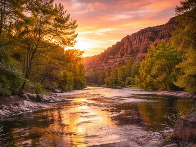 Golden light over the tranquil Camp Verde stretch of river canyon, highlighting lush riparian beauty