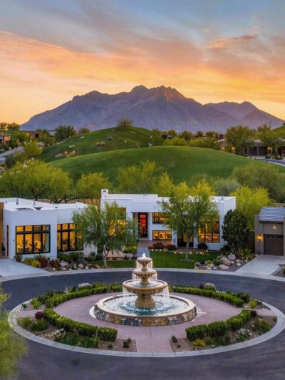 Aerial view of Fountain Hills Arizona with desert mountains and residential neighborhoods.