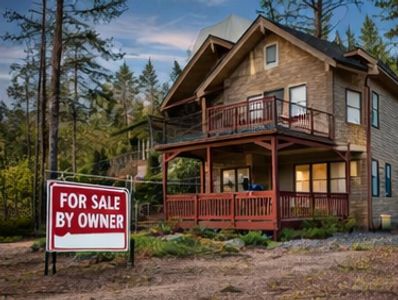 Scenic cabin-style home in Show Low, Arizona surrounded by tall pine trees, representing the popular