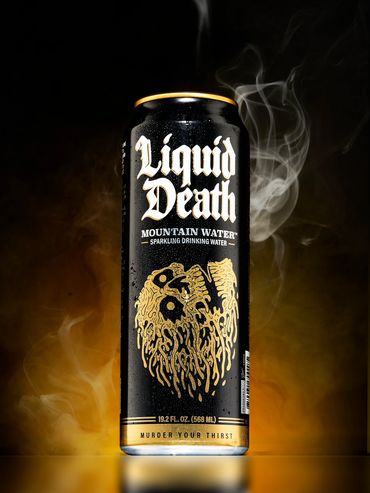 Close-up shot of a liquor bottle being photographed for product showcase