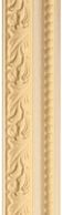 Close-up of an ornate cream-colored decorative molding with intricate floral patterns.