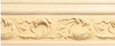 Decorative cream-colored plaster molding with intricate floral patterns.