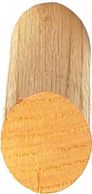 Wooden cutting board with a circular orange cheese slice.