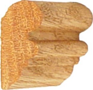 Close-up of a wood molding corner piece with intricate profile.