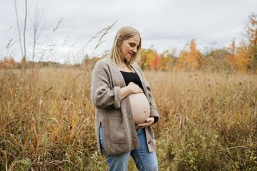 maternity photo in meadow