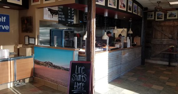 Restaurant outlet with a black board 