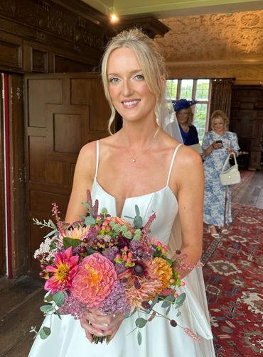 Enhancing natural bridal makeup for this bride at Dorfold Hall Nantwich Cheshire