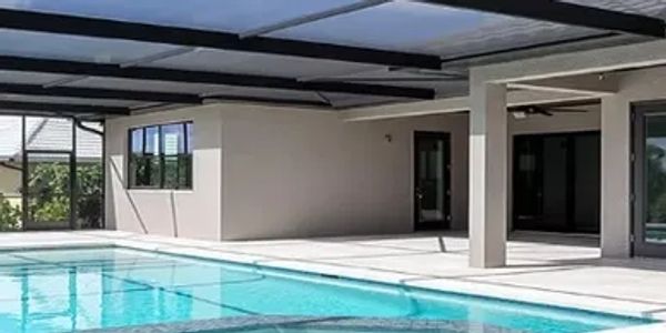 Modern backyard with covered swimming pool.