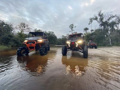 Side by side
ATV
off road vehicle
Polaris Razor
riding through the woods