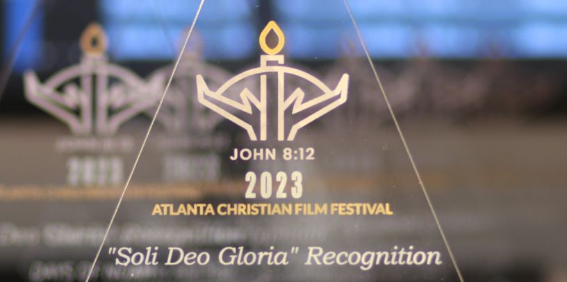 Atlanta Christian Film Festival 2023 award with Bible verse John 8:12.