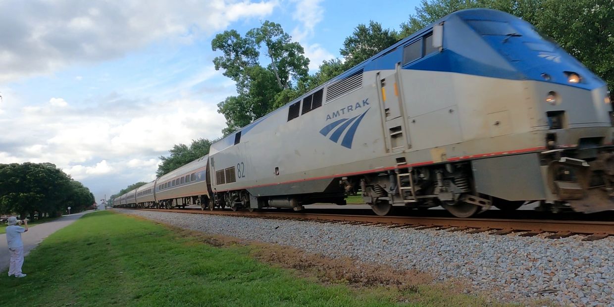 Amtrak 82, a P42, powers a train through Scranton, SC at 79 MPH in July of 2021.