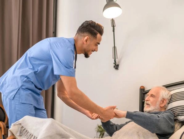 Experienced home care nurse assisting senior client with personalized care planning