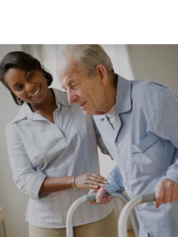 Professional caregiver assisting senior with mobility and in-home care services.”