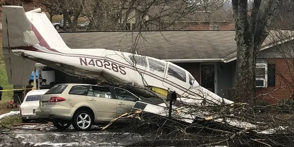 Downed plane came to rest on a car. on Tuesday, Dec. 19, 2017, in East Knoxville.
Tyler Whetstone / 
