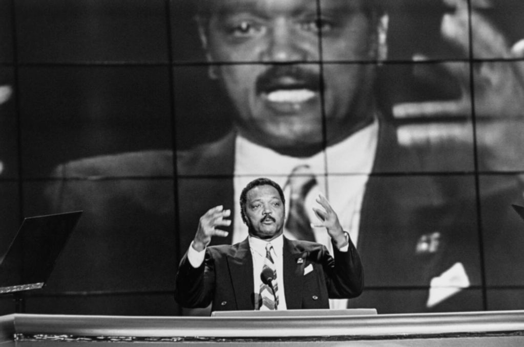 Man passionately giving a speech at a podium.
