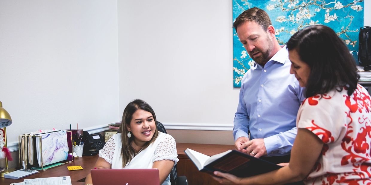 Operations manager Marisol Salazar Arias Immigration attorneys Mark Kinzler and Cristina Zambrano 