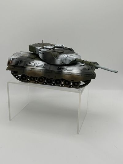 Model tank displayed on a clear plastic stand against a plain background.