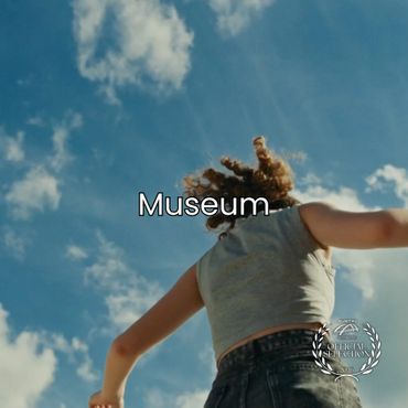 Person looking up at a bright blue sky with clouds, labeled 'Museum'.