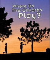 Silhouetted children playing outdoors at sunset under trees.